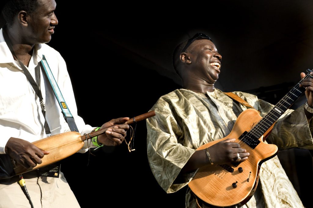 Bassekou Kouyate and Vieux Farka Toure by Susan Schulman. 