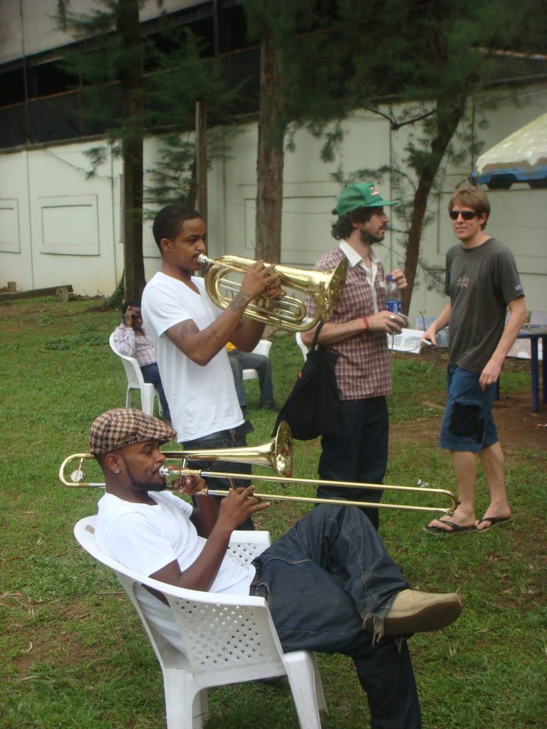 Hypnotic Brass Ensemble warming up, photo by Stephen Budd