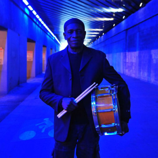 Tony Allen in blue corridor